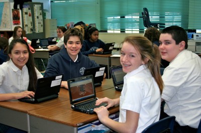 8th graders on the laptops in English class